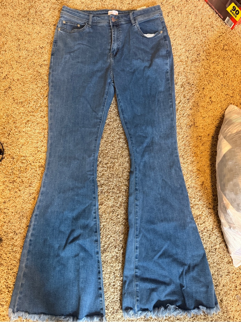 Pink Lily Medium Blue High-Rise Flare Jeans with Raw Hem